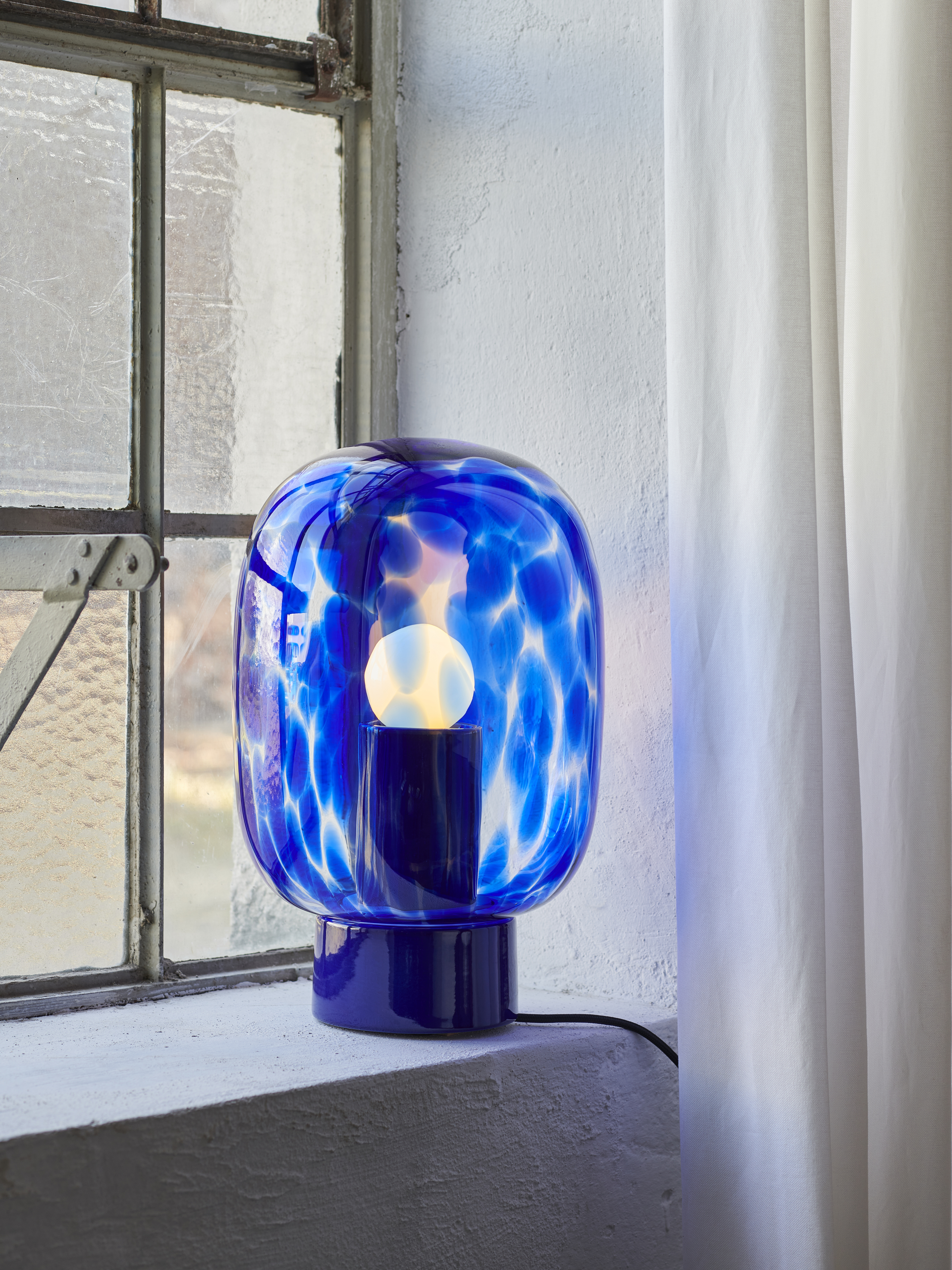 favius Tischleuchte Flakes blau